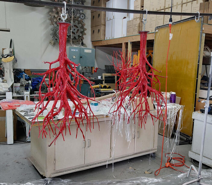 Trees with resin and fibers applied